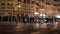 Night view of people on crosswalk in Carrer de Xativa. Valencia, Spain