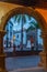 Night view of plaza de espana through arcade of town hall of Santa Cruz de la Palma, Canary islands, Spain