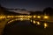 Night view of \'Ponte Mazzini\' bridge over the Tiber River in Rome