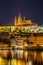 Night View of Prague castle, the largest coherent castle complex in the world, with the reflection on Vltava river