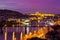 Night view of the prague castle and railway bridge over vltava/moldau river in prague taken from the top of vysehrad castle