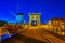 Night view of Rembrandt bridge and de Put windmill in Leiden, Netherlands