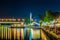 Night view of restaurants on the shore of donau river near VIC and Donauturm in Vienna, Austria....IMAGE