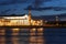 Night view of the rostral columns, Exchange Building, Neva from the Palace Embankment. Petersburg,