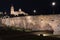 Night view of Salamanca cathedral and Roman bridge over Tormes river , Salamanca, Spain.