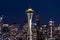 Night view of Seattle, Washington with the iconic Space Needle in the center.