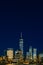 Night view of skyline of downtown Manhattan under dark blue sky