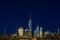 Night view of skyline of downtown Manhattan under dark blue sky