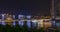 Night view of skyline at the junction of Yangtze and Jialing Rivers with reflections of the water in Chongqing