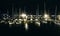 Night view of some leisure yachts moored at a dock in Lakeview