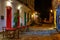 Night view of street of historical center with tables of restaurant in Paraty, Rio de Janeiro, Brazil.