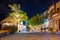 Night view of a street with night life, cafe and restaurants in Plaka village, at the gulf of Elounda, Greece