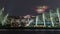 A night view of The Supertree Grove, Cloud Forest and Flower Dome at Gardens by the Bay in Singapore timelapse.