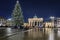 Night view to the Brandeburg Gate in Berlin, Germany, with a lit christmas tree in front