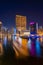 Night view to Dubai Marina skyline, reveals Pier 7 and boats. Luxury destination for tourists and residents.