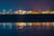 Night view to the Palm Jumeirah panorama. Luxury destination for tourists and residents. Amazing colors reflects on the water.