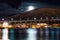 Night view of Tromso Bridge with lights in the city of Tromso in