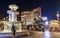 Night view of Venetian hotel fountain and Treasure Island hotel building