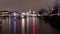 A night view of Zurich with lake and typical church