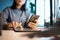 Night, woman hands and smartphone, tablet and planning in dark office desk, startup or company. Closeup businesswoman