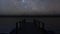 Night wooden pier on Blue starry sky Rural scene