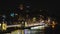 Nightlife of shiny capital of muslim country, illuminated bridge, life in hurry