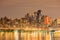 Nightlight of New York City Manhattan downtown with the reflection over Hudson River panorama.