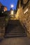 Nightscape of steps in streets of Edinburgh with starburst lights