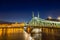 Nightshot at chain bridge on Danube river with lights