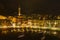 Nighttime aerial cityscape of Lecco town. Picturesque waterfront of Lecco town located between famous Lake Como and scenic Bergamo