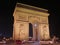 Nighttime close up view of the arc de triomphe de l`etoile, paris