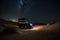 nighttime desert safari with a view of the stars and moon above