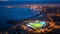 Nighttime Football Stadium By The Ocean: A Santiago Rusinol Inspired Masterpiece