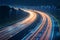 Nighttime journey Car light trails illuminate highway, creating mesmerizing glow