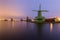 Nighttime landscape of river with windmills at `Zaanse Schans`