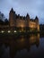 Nighttime panorama reflection of medieval Castle Chateau de Josselin in river Oust Morbihan Brittany France Europe