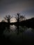 Nighttime reflection pond evening shadows