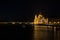 Nighttime river view of the parliament building in Budapest Hung