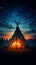 Nighttime scene Silhouette of an Indian teepee with starry sky