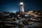 Nighttime Shadows: A Long Exposure of a Rotating Lighthouse Beam by the Sea