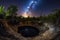 nighttime sinkhole capture with starry night sky and shining moon