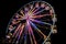 Nighttime Thrills: The Mesmerizing Beauty of a Ferris Wheel Illuminated Against the City Skyline, ai generative