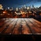 Nighttime urban scene Wooden table against blurred city building lights in darkness