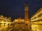 Nighttime view of a flooded San Marco Plaza during the high water tide