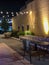 Nighttime view of outdoor seating area
