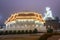 Nighttime at Wat Huay Pla Kang temple,lit up,with Big Buddha towering beyond,Chiang Rai City,Thailand