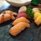 Nigiri with salmon, tuna, shrimp and cooked salmon