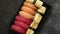 Nigiri sushi set in plastic container ready for takeout delivery. Closeup of take away lunch box