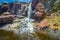 Nigretta Falls crushing on colorful rocks in Bochara, Victoria, Australia.