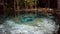 Nigth photo of the surface of the water od the Devils ear cavern in Ginnie Springs